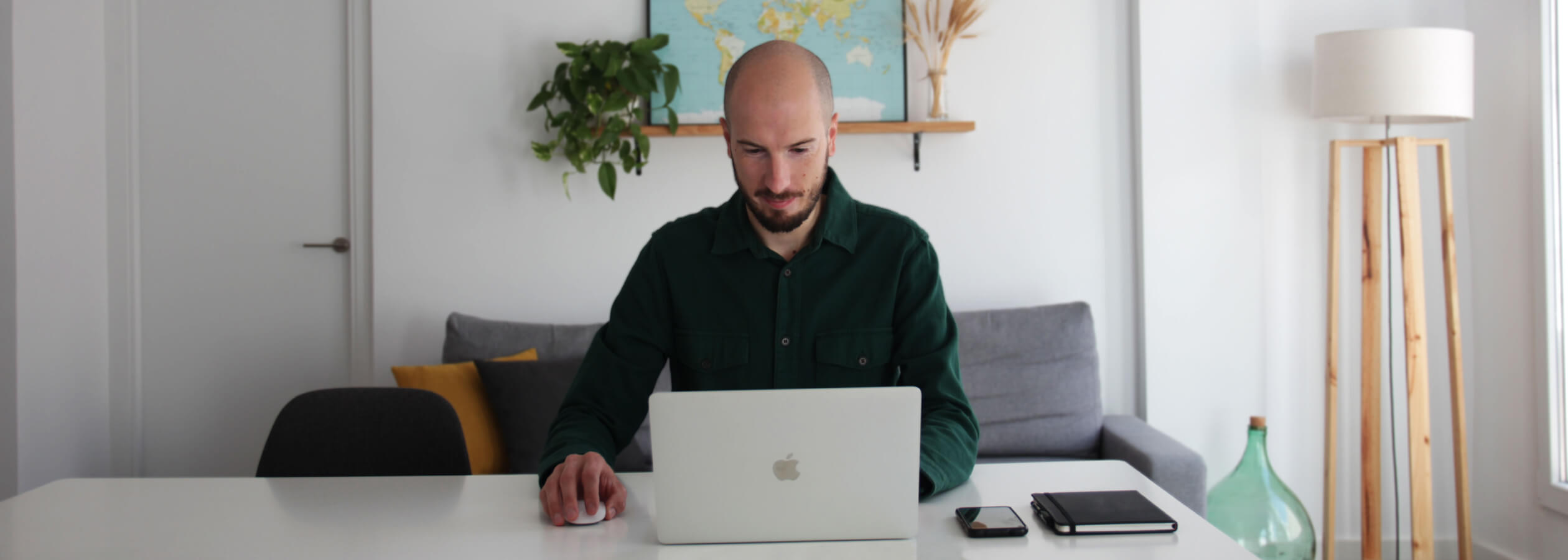 portrait of Pietro Vallome in front of a laptop