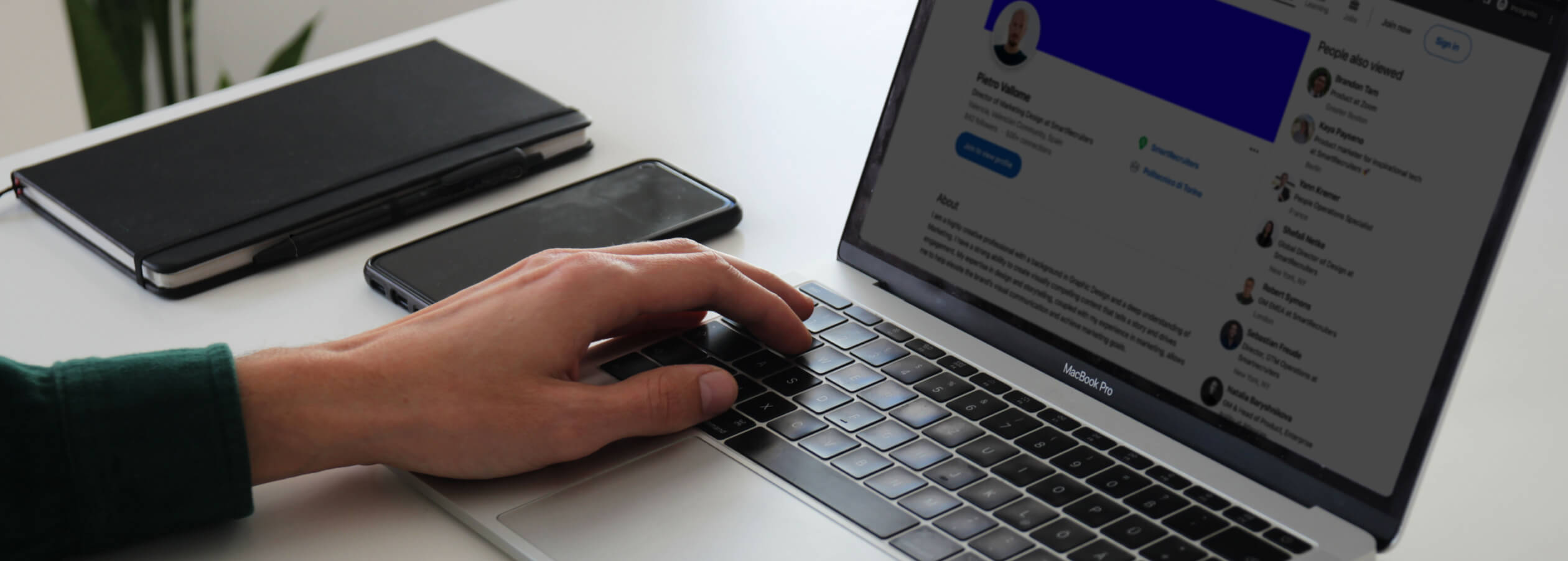 hands on the keyboard of a laptop